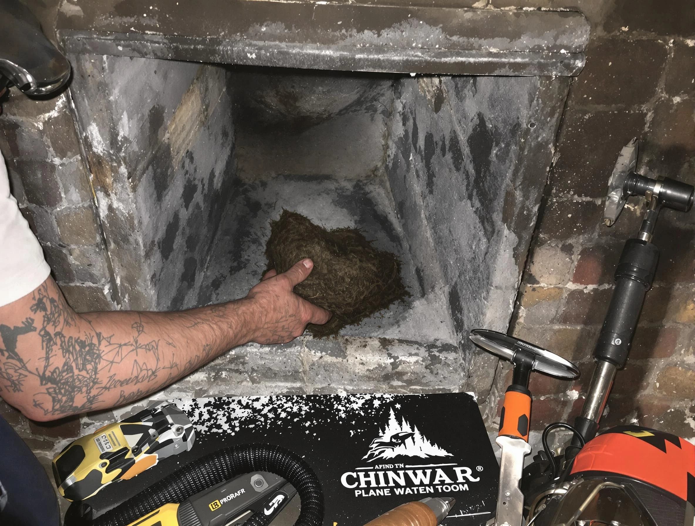 Mount Pleasant Chimney Sweep safely removing debris and screening chimney in Mount Pleasant, TN